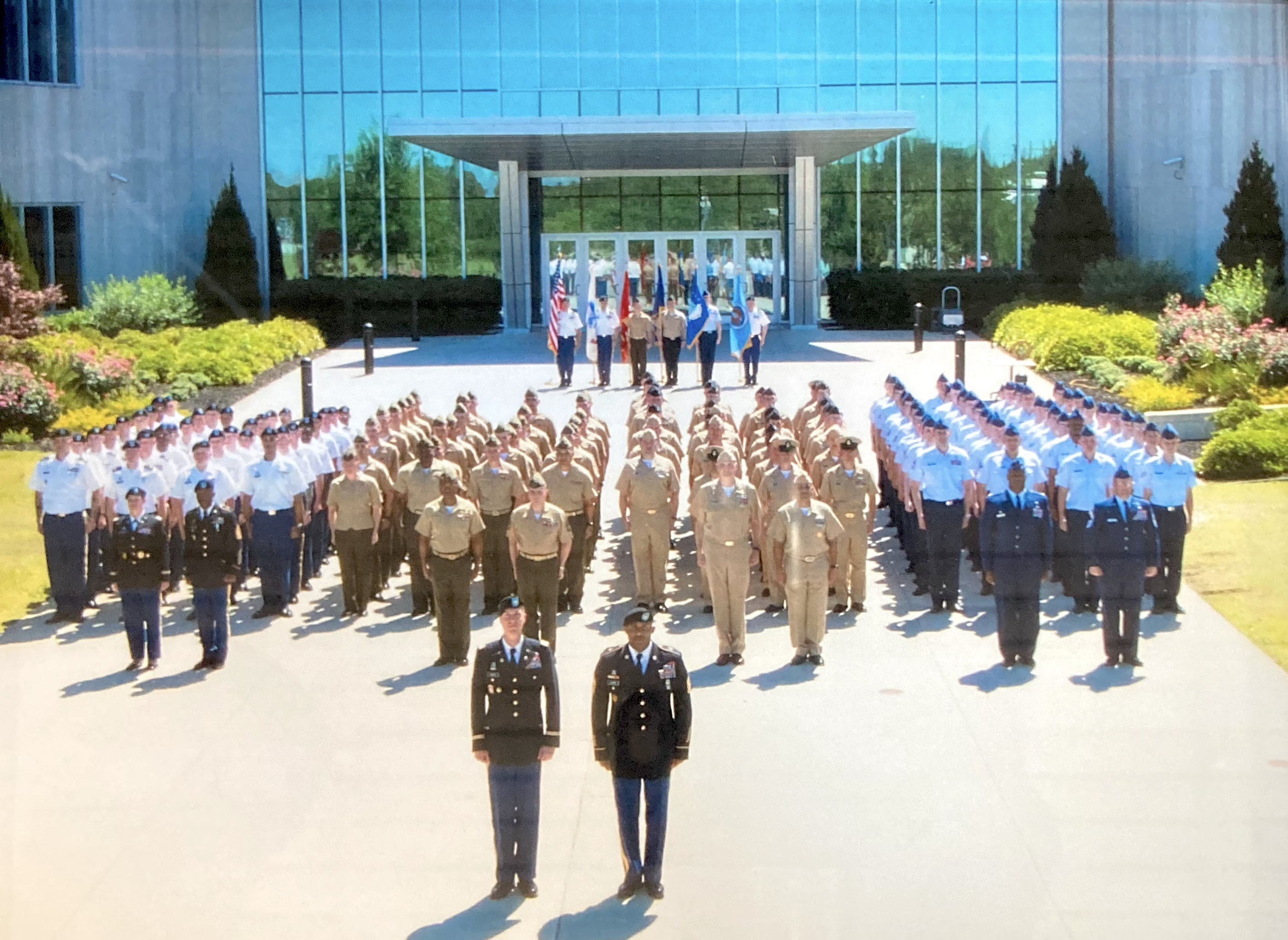 Joint Service formation outside SCIF (Justin holding Marines flag)